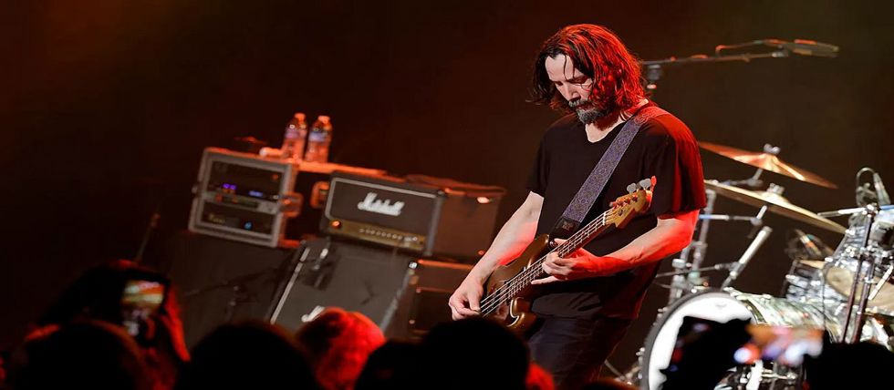 Keanu Reeves performs with his band Dogstar