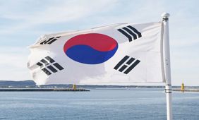 The South Korean flag flying from a mast
